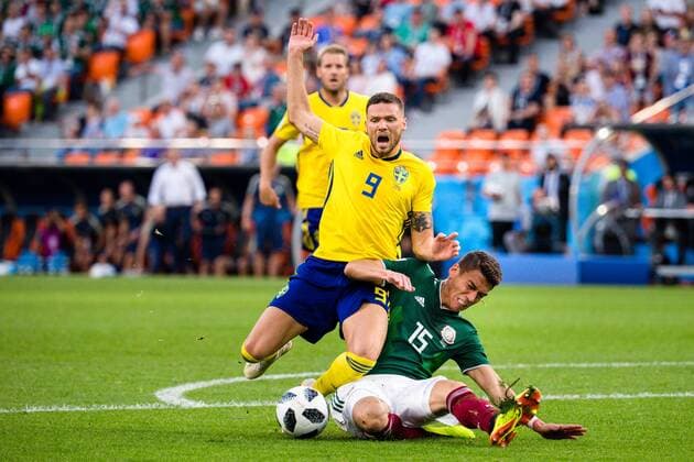 180627 Marcus Berg of Sweden and Hector Moreno of Mexico during the FIFA World Cup WM Weltmeisterschaft Fussball group stage match between Mexico and Sweden on June 27, 2018 in Ekaterinburg. Photo: Petter Arvidson BILDBYRN kod PA 87737 Copyright: PETTERxARVIDSON BB180627PA221