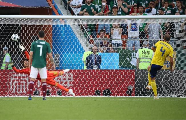 (180627) -- YEKATERINBURG, June 27, 2018 -- Andreas Granqvist (R) of Sweden scores a penalty kick during the 2018 FIFA World Cup WM Weltmeisterschaft Fussball Group F match between Mexico and Sweden in Yekaterinburg, Russia, June 27, 2018. Sweden won 3-0. Mexico and Sweden advanced to the round of 16. ) (SP)RUSSIA-YEKATERINBURG-2018 WORLD CUP-GROUP F-MEXICO VS SWEDEN LixMing 
