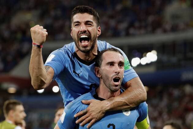 Sport Themen der Woche KW26 Sport-Bilder des Tages WM 2018, Uruguay - Portugal Uruguayan defender Godin (R) and Uruguayan forward Luis Suarez at the end of the FIFA World Cup WM Weltmeisterschaft Fussball 2018 round of 16 soccer match between Uruguay and Portugal, at Fisht Stadium in Sochi, Russia, 30 June 2018. URUGUAY VS. PORTUGAL !ACHTUNG: NUR REDAKTIONELLE NUTZUNG!  Copyright: xSebastiaoxMoreirax FWC50-243 20180630-636659929696118574