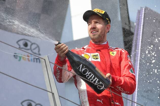FORMULA 1 - GP of Austria 2018 SPIELBERG,AUSTRIA,01.JUL.18 - MOTORSPORTS - Grand Prix of Austria, Red Bull Ring. Image shows the rejoicing of Sebastian Vettel (GER Ferrari). Keywords: champaign. GEPAxpictures xChristianxWalgram