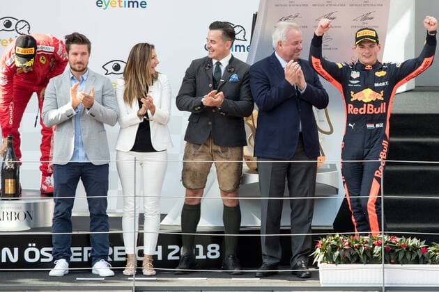 FORMULA 1 - GP of Austria 2018 SPIELBERG,AUSTRIA,01.JUL.18 - MOTORSPORTS - Grand Prix of Austria, Red Bull Ring. Image show Sebastian Vettel (GER Ferrari), Marcel Hirscher (AUT), Maglena Krumova (eyetime international), Andreas Gabalier and governor Hermann Schuetzenhoefer (Styria) and the rejoicing of Max Verstappen (NED Red Bull Racing). GEPAxpictures xMaticxKlansek