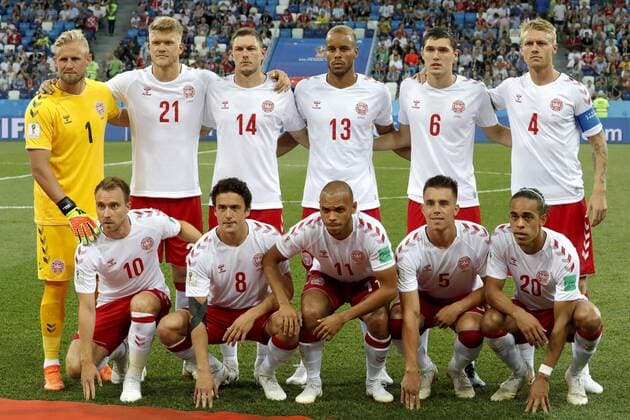 NIZHNY NOVGOROD, RUSSIA - JULY 1, 2018: Denmark s Christian Eriksen, Thomas Delaney, Martin Braithwaite, Jonas Knudsen, Yussuf Poulsen (L-R front), goalkeeper Kasper Schmeichel, Andreas Cornelius, Henrik Dalsgaard, Mathias Joergensen, Andreas Christensen and Simon Kjaer (L-R background) pose for a group photograph ahead of the 2018 FIFA World Cup WM Weltmeisterschaft Fussball Round of 16 football match against Croatia at Nizhny Novgorod Stadium. Mikhail Japaridze TASS  TS087739