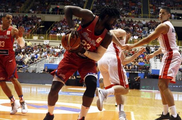 Puerto Rico s John Holland (C) in action during a game for the FIBA Basketball World Cup 2019 qualifying, in San Juan, Puerto Rico, 1 July 2018. The World Cup will be held next year in China. Puerto Rico - Mexico !ACHTUNG: NUR REDAKTIONELLE NUTZUNG!  Copyright: xThaisxLlorcax SNJ119 20180702-636660976911032841
