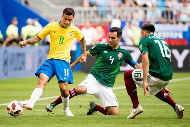 180702 Philippe Coutinho of Brazil and Rafael Marquez of Mexico during the FIFA World Cup WM Weltmeisterschaft Fussball round of 16 match between Brazil and Mexico on July 2, 2018 in Samara. Photo: Petter Arvidson BILDBYRAN kod PA 92081 Copyright: PETTERxARVIDSON BB180702PA031