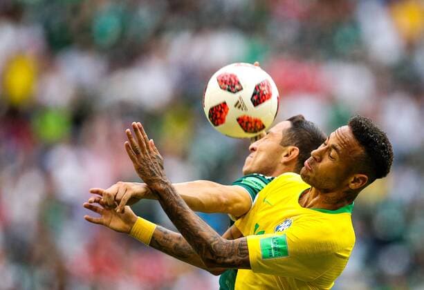 SAMARA, RUSSIA - JULY 2, 2018: Brazilâ€™s Neymar (R) and Mexicoâ€™s Andres Guardado in their 2018 FIFA World Cup WM Weltmeisterschaft Fussball Round of 16 match at Samara Arena Stadium. Sergei Bobylev TASS  TS08794F