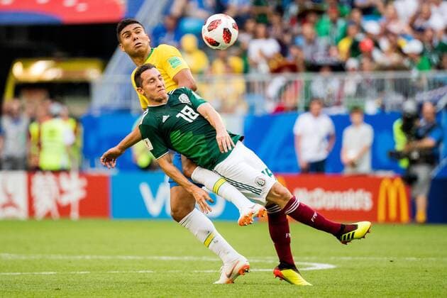 180702 Andres Guardado of Mexico and Casemiro of Brazil during the FIFA World Cup WM Weltmeisterschaft Fussball round of 16 match between Brazil and Mexico on July 2, 2018 in Samara. Photo: Petter Arvidson BILDBYRAN kod PA 92081 Copyright: PETTERxARVIDSON BB180702PA078