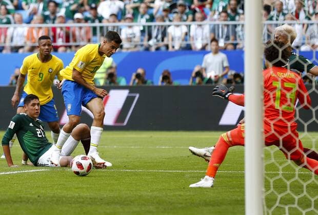 Brazil vs. Mexico SAMARA, SA - 02.07.2018: BRAZIL VS. MEXICO - Philippe Coutinho from Brazil and Edson ALVAREZ from Mexico during the match between Brazil and Mexico, valid for the eighth round of the 2018 World Cup held at the Samara Arena in Samara, Russia. (Photo: Rodolfo Buhrer La Imagem Fotoarena) x1560624x  RodolfoxBuhrer