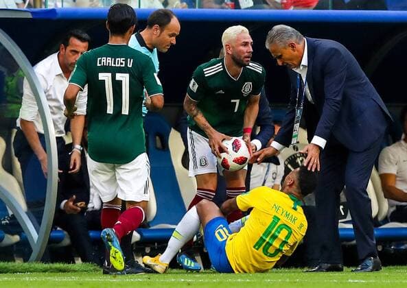 SAMARA, RUSSIA - JULY 2, 2018: Mexicoâ€™s Carlos Vela (L front), Miguel Layun (C standing), Brazilâ€™s Neymar (C front) and his head coach Tite (Adenor Leonardo Bacchi) in their 2018 FIFA World Cup WM Weltmeisterschaft Fussball Round of 16 match at Samara Arena Stadium; Brazil wins 2-0. Sergei Savostyanov TASS  TS0879A3