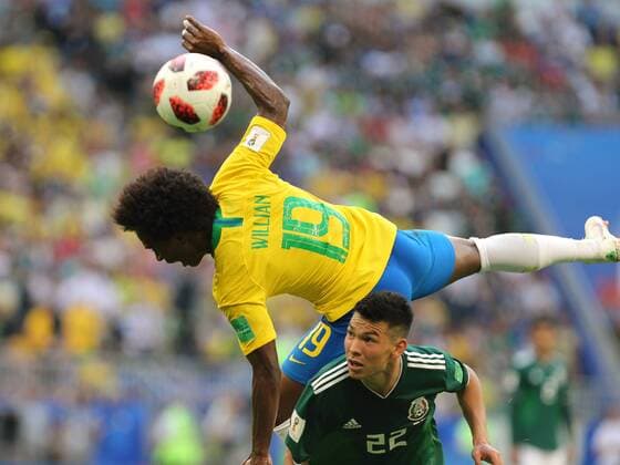 July 2, 2018, Russia, Samara, FIFA World Cup WM Weltmeisterschaft Fussball 2018, 1 8 finals. Football match of Brazil - Mexico at the stadium Samara - Arena. Player of the national team Nationalteam Willian (19), Irving Lozano (22) AlexanderxKulebyakin 