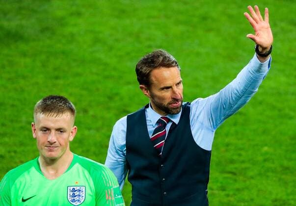MOSCOW, RUSSIA - JULY 3, 2018: England s goalkeeper Jordan Pickford (L) and manager Gareth Southgate after their victory in the 2018 FIFA World Cup WM Weltmeisterschaft Fussball Round of 16 match against Colombia at Spartak Stadium. England won the game 4-3 in a penalty shootout. Denis Tyrin TASS  TS087E1B