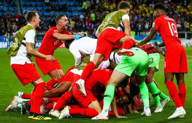 MOSCOW, RUSSIA - JULY 3, 2018: England s players celebrate their victory in the 2018 FIFA World Cup WM Weltmeisterschaft Fussball Round of 16 match against Colombia at Spartak Stadium. England won the game 4-3 in a penalty shootout. Anton Novoderezhkin TASS  TS087E1D