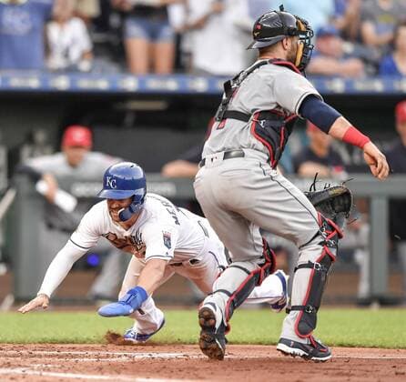 July 3, 2018 - Kansas City, MO, USA - The Kansas City Royals Whit Merrifield scores around Cleveland Indians catcher Yan Gomes on a double by Rosell Herrera in the second inning on Tuesday, July 3, 2018, at Kauffman Stadium in Kansas City, Mo. Cleveland at Kansas City - ZUMAm67_ 20180703_zaf_m67_037 Copyright: xJohnxSleezerx