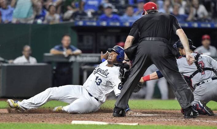 July 3, 2018 - Kansas City, MO, USA - Cleveland Indians catcher Yan Gomes tags out the Kansas City Royals Salvador Perez, left, trying to score on a single by Hunter Dozier to end the eighth inning on Tuesday, July 3, 2018, at Kauffman Stadium in Kansas City, Mo. Cleveland at Kansas City - ZUMAm67_ 20180703_zaf_m67_052 Copyright: xJohnxSleezerx