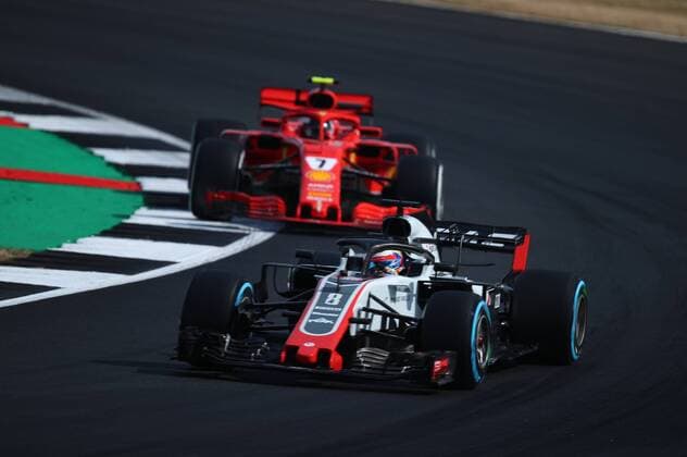 Romain Grosjean (Haas F1 Team) und Kimi Raikkoenen (Scuderia Ferrari) AUT, FIA, Formel 1, Grosser Preis von Grossbritannien Silverstone Copyright: xEIBNER Illmannx EX_EER