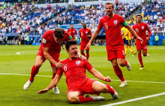 Sport Themen der Woche KW27 Sport Bilder des Tages SAMARA, RUSSIA - JULY 7, 2018: England s John Stones, Harry Maguire and Harry Kane (L-R) celebrate scoring in the 2018 FIFA World Cup WM Weltmeisterschaft Fussball Quarterfinal match against Sweden at Samara Arena Stadium. Denis Tyrin TASS  TS088714