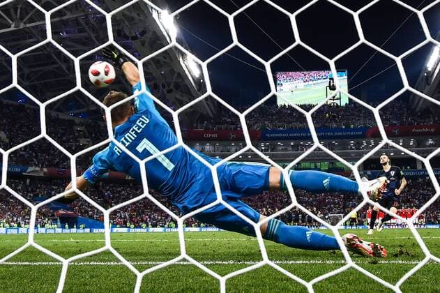 Sport-Bilder des Tages Igor Akinfeev of Russia reacts against a penalty kick by Croatia in their quarterfinal match during the 2018 FIFA World Cup WM Weltmeisterschaft Fussball in Sochi, Russia, 7 July 2018. Russia¡¯s 2018 World Cup is over. The hosts are out. Their campaign ended just as it had climaxed six days earlier, on penalties. But only after 120 minutes of twists and turns ¨C 120 minutes befitting of the tournament¡¯s most unforeseen run. Russia had been ahead, then behind, then, for the second straight elimination match against a favored European side, level and headed to the penalty spot. But this time it fell, by the finest of margins, to Croatia. Ivan Rakitic, for the second time in seven days, stepped up to the penalty spot in the final round of a shootout. And just like he had on Sunday, he sent Croatia through in the World Cup knockout rounds, this time to the semifinals, where England awaits. *** Local Caption *** Croatia ends Russia s World Cup run, squeaks through to semis on penalties  20180708_44345