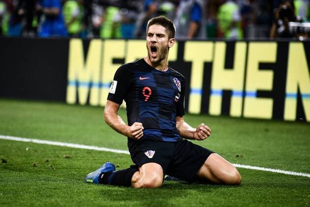 Andrej Kramaric of Croatia reacts after scoring a goal against Russia in their quarterfinal match during the 2018 FIFA World Cup WM Weltmeisterschaft Fussball in Sochi, Russia, 7 July 2018. Russia¡¯s 2018 World Cup is over. The hosts are out. Their campaign ended just as it had climaxed six days earlier, on penalties. But only after 120 minutes of twists and turns ¨C 120 minutes befitting of the tournament¡¯s most unforeseen run. Russia had been ahead, then behind, then, for the second straight elimination match against a favored European side, level and headed to the penalty spot. But this time it fell, by the finest of margins, to Croatia. Ivan Rakitic, for the second time in seven days, stepped up to the penalty spot in the final round of a shootout. And just like he had on Sunday, he sent Croatia through in the World Cup knockout rounds, this time to the semifinals, where England awaits. *** Local Caption *** Croatia ends Russia s World Cup run, squeaks through to semis on penalties  20180708_01574