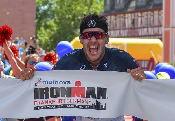 Sport - Bilder des Tages 08.07.2018, xblx, Mainova IRONMAN European Championship EM Europameisterschaft Frankfurt 2018, emspor, v.l. Jan Frodeno (Deutschland) als Sieger im Ziel, Gewinner Frankfurt am Main