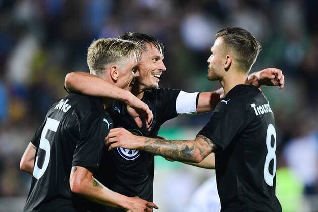 180710 Sören Rieks celebrates with Markus Rosenberg and Arnor Ingvi Traustason of Malmö FF after Rosenberg scored 0-3 during the UEFA Champions League qualifying match between FC Drita and Malmö FF on July 10, 2018 in Pristina. Photo: Ludvig Thunman BILDBYRAN kod LT 92086 Copyright: LUDVIGxTHUNMAN BB180710LT045