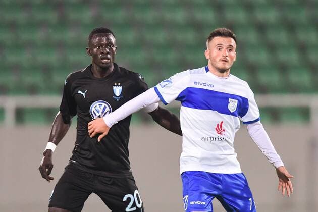 180710 Bonke Innocent of Malmö FF and Endrit Krasniqi of Drita during the UEFA Champions League qualifying match between FC Drita and Malmö FF on July 10, 2018 in Pristina. Photo: Ludvig Thunman BILDBYRAN kod LT 92086 Copyright: LUDVIGxTHUNMAN BB180710LT066