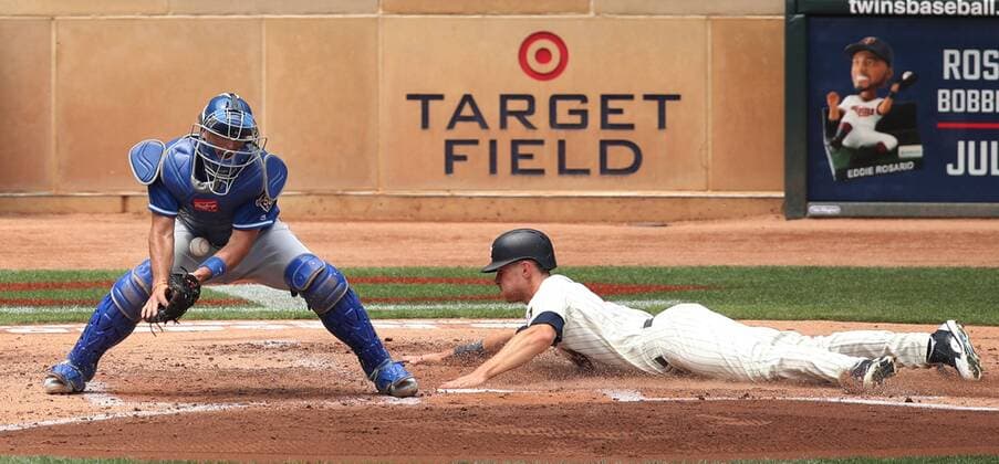 July 11, 2018 - Minneapolis, MN, USA - Minnesota Twins right fielder Max Kepler slides home safely in the second inning as Kansas City Royals catcher Drew Butera waits on the throw at Target Field in Minneapolis on Wednesday, July 11, 2018. The Twins won, 8-5. Kansas City at Minnesota - ZUMAm67_ 20180711_zaf_m67_007 Copyright: xJerryxHoltx