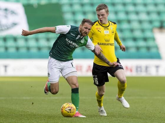 12th July 2018, Easter Road, Edinburgh, Scotland; UEFA Europa League football, first qualifying round, 1st leg, Hibernian versus NSI Runavik; Martin Boyle of Hibernian and Petur Knudsen of NSI Runavik  ActionPlus12047056 AlanxRennie