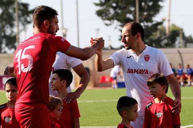 12 07 2018 - Centenary Stadium, Ta Qali, Malta UEFA Europa League 2018 2019 First Qualifying Round, First Leg Players from both teams shake hands as a sign of fair play and respect ahead of the UEFA Europa League, First Qualifying Round, first leg match between Balzan FC of Malta and Kesla FK from Azerbaijan at the Centenary Stadium, Ta Qali, Malta on 12 July, 2018. Balzan FC won the first leg 4-1. Balzan FC v Kesla FK - UEFA Europa League 2018 19 UEL_18_19