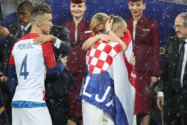 Football World Cup 2018 winners 15.07.2018. Moscow, Russia - Football World Cup 2018 , Finals, Croatia - France. Emmanuel Macron, Ivan Perisic, Kolinda Grabar-Kitarovic, Domagoj Vida.  IgorxKralj PIXSELL