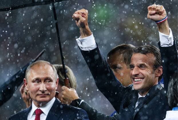 MOSCOW, RUSSIA â€“ JULY 15, 2018: Russia s President Vladimir Putin (L) and France s President Emmanuel Macron at a victory ceremony after the 2018 FIFA World Cup WM Weltmeisterschaft Fussball final football match between France and Croatia at Luzhniki Stadium. Team France won the game 4:2 and claimed the World Cup title. Mikhail Tereshchenko TASS  TS089B60