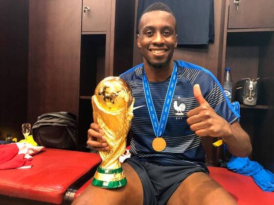 The French team, world champions, celebrate the victory in the locker room with Emmanuel Macron. Blaise Matuidi Russia  592548