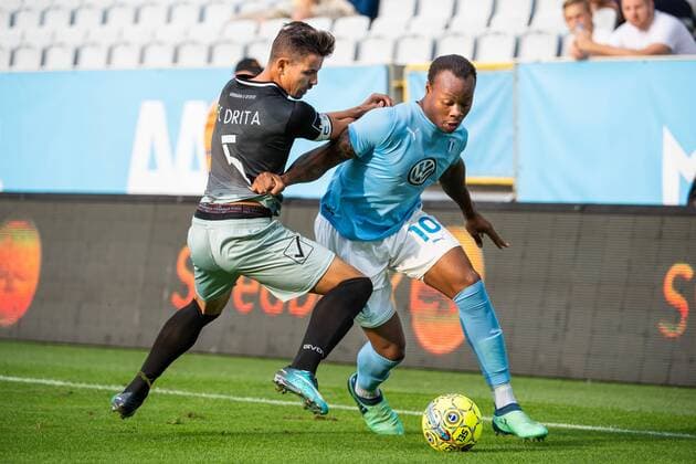 180717 Ardian Limani of Drita competes for the ball with Carlos Strandberg of Malmö FF during the UEFA Champions League qualifying match between Malmö FF and Drita on July 17, 2018 in Malmö. Photo: Ludvig Thunman BILDBYRAN kod LT 35506 Copyright: LUDVIGxTHUNMAN BB180717LT006