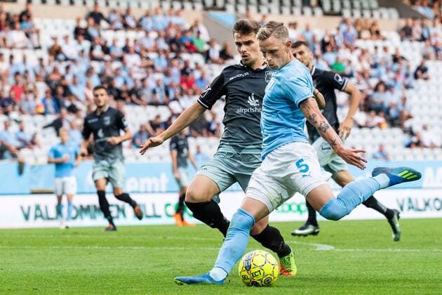 180717 Drilon Musaj of Drita and Sören Rieks of Malmö FF in action during the UEFA Champions League qualifying match between Malmö FF and Drita on July 17, 2018 in Malmö. Photo: Ludvig Thunman BILDBYRAN kod LT 35506 Copyright: LUDVIGxTHUNMAN BB180717LT041