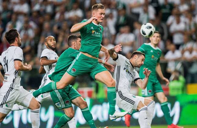 UEFA Champions League First Qualifying Round Second Leg, Stadion Wojska Polskiego, Warsaw, Poland 17 7 2018 Legia Warsaw vs Cork City Cork s Sean McLoughlin with Marko Vesovic of Legia Sean McLoughlin with Marko Vesovic 17 7 2018  Copyright: x©INPHO TomaszxJastrzebowskix 20180717toja8363