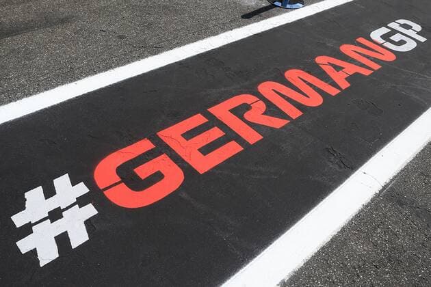 19th July 2018, Hockenheimring, Hockenheim, Germany; German Formula One Grand Prix, driver arrivals and press conference PK Pressekonferenz German GP writing in pit lane  ActionPlus12048657 Octane