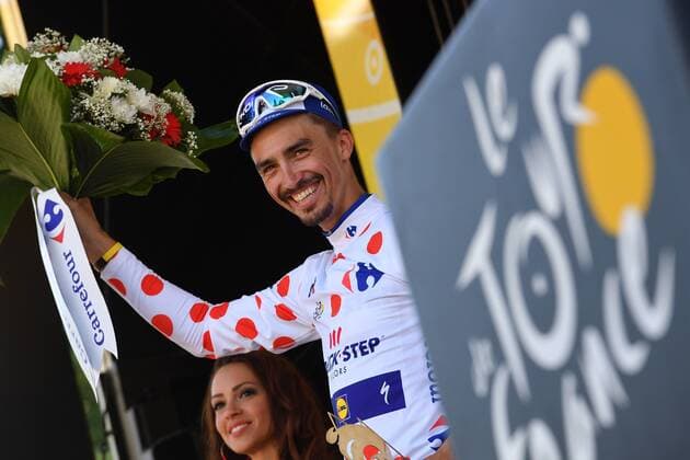 Sport - Bilder des Tages French Julian Alaphilippe of Quick-Step Floors celebrates on the podium in the red polka-dot jersey for best climber after winning the 16th stage of the 105th edition of the Tour de France cycling race, 218km from Carcassone to Bagneres-de-Luchon, France, Tuesday 24 July 2018. This year s Tour de France takes place from July 7th to July 29th. - FRANCE OUT DAVIDxSTOCKMAN  x05391902x