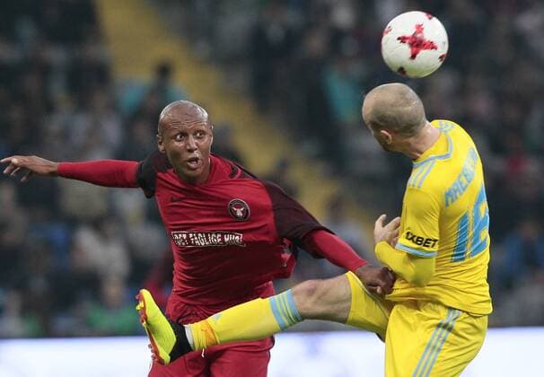Sport - Bilder des Tages FCM s Ayo Okosun and Maevski vie for the ball during the UEFA Champions League second qualifying round first leg football match between FC Astana and FC Midtjylland in Astana on July 24, 2018. , Denmark  Copyright: ALEXEIxFILIPPOVx cop108 spdk20180724-172824-L
