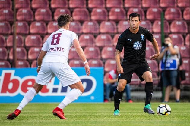 180724 Damjan Djokovic of Cluj and Behrang Safari of Malmö FF in action during the UEFA Champions League qualifying match between Cluj and Malmö FF on July 24, 2018 in Cluj. Photo: Ludvig Thunman BILDBYRAN kod LT 35510 Copyright: LUDVIGxTHUNMAN BB180724LT025