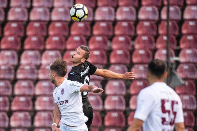 180724 Damjan Djokovic of Cluj and Arnor Ingvi Traustason of Malmö FF competes for the ball during the UEFA Champions League qualifying match between Cluj and Malmö FF on July 24, 2018 in Cluj. Photo: Ludvig Thunman BILDBYRAN kod LT 35510 Copyright: LUDVIGxTHUNMAN BB180724LT026
