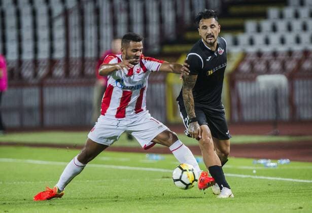 24th July 2018, Rajko Mitic Stadium, Belgrade, Serbia; UEFA Champions League, second qualifying round, 1st leg, Red Star Belgrade versus FK Suduva; Lorenzo Ebecilio of Red Star Belgrade challenges Gerson Acevedo of Suduva  ActionPlus12050283 NikolaxKrstic