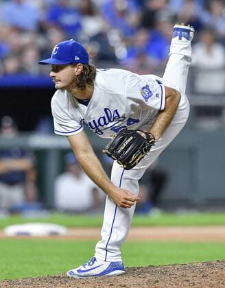 July 24, 2018 - Kansas City, MO, USA - Kansas City Royals starting pitcher Burch Smith follows through on a pitch in the seventh inning against the Detroit Tigers on Tuesday, July 24, 2018, at Kauffman Stadium in Kansas City, Mo. Detroit at Kansas City - ZUMAm67_ 20180724_zaf_m67_049 Copyright: xJohnxSleezerx