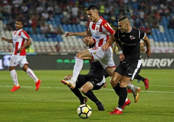 (180725) -- BELGRADE, July 25, 2018 -- Crvena Zvezda s Nemanja Radonjic (2nd R) vies with Suduva s Andro Svrljuga (1st R) during the UEFA Champions League second qualifying round football match between Crvena Zvezda and Suduva in Belgrade, Serbia on July 24, 2018. Crvena Zvezda won 3-0. ) (SP)SERBIA-BELGRADE-FOOTBALL-UEFA CHAMPIONS LEAGUE-QUALIFYING-CRVENA ZVEZDA VS SUDUVA PredragxMilosavljevic 
