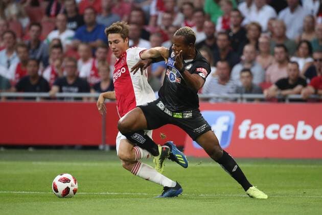 SOCCER - UEFA CL quali, Ajax vs Sturm AMSTERDAM,NETHERLANDS,25.JUL.18 - SOCCER - UEFA Champions League qualification, AFC Ajax Amsterdam vs SK Sturm Graz. Image shows Carel Eiting (Ajax) and Emeka Eze (Sturm). GEPAxpictures xChristianxWalgram