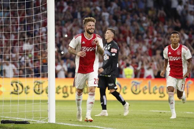 (L-R) Lasse Schone of Ajax, Dario Maresic of Sturm Graz, David Neres of Ajax during the UEFA Champions League second round qualifying first leg match between Ajax Amsterdam and Sturm Graz at the Johan Cruijff Arena on July 25, 2018 in Amsterdam, The Netherlands UEFA Champions League 2018 2019 xVIxVIxImagesx xMauricexvanxSteenxIVx 11586616