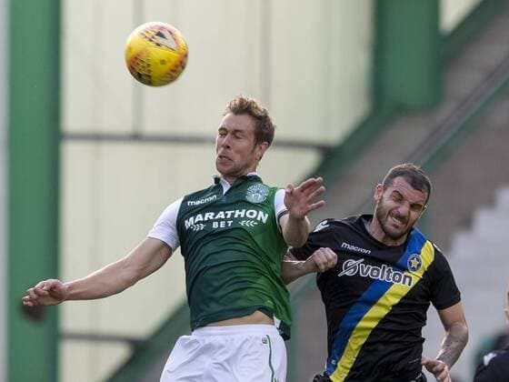 26th July 2018, Easter Road, Edinburgh, Scotland; UEFA Europa League 2nd qualifying round, 1st leg, Hibernian versus Asteras Tripolis; Steven Whittaker of Hibernian wins the hader from Nikos Kaltsas of Asteras Tripoli FC  ActionPlus12050646 AlanxRennie