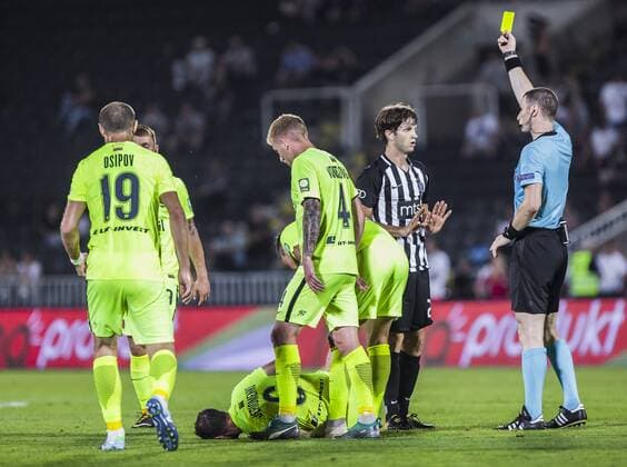 26th July 2018, Partizan Stadium, Belgrade, Serbia; UEFA Europa League 2nd qualifying round, 1st leg, FK Partizan versus FK Trakai; Referee Georgi Kabakov of Bulgaria gives a yellow card to Nebojsa Kosovic of Partizan  ActionPlus12050690 NikolaxKrstic