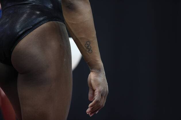 July 27, 2018: SIMONE BILES shows off her Olympic rings tattoo during podium training before the G.K. U.S. Classic. This is Biles first competition since winning the gymnastics all-around gold at the 2016 Rio Olympic Games Olympische Spiele Olympia OS CSM 2018: G.K. U.S. Classic Gymnastics JUL 27 - ZUMAc04_ 20180727_zaf_c04_142 Copyright: xMelissaxJ.xPerensonx