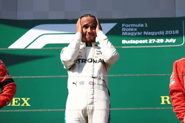 29th July 2018, Hungaroring, Mogyorod, Hungary; Hungarian Formula One Grand Prix, race day; Mercedes AMG Petronas Motorsport, Lewis Hamilton takes the win and celebrates on the podium  ActionPlus12051636 Octane