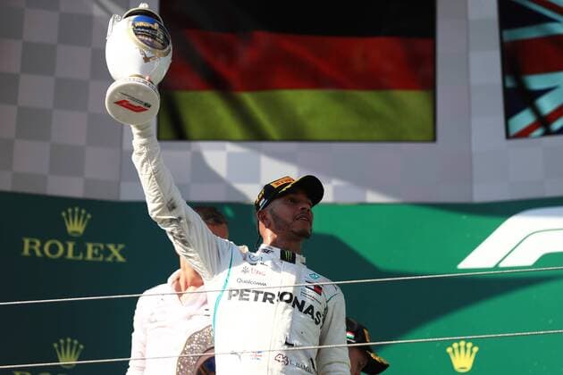 29th July 2018, Hungaroring, Mogyorod, Hungary; Hungarian Formula One Grand Prix, race day; Mercedes AMG Petronas Motorsport, Lewis Hamilton takes the win and accepts his trophy on the podium  ActionPlus12051626 Octane