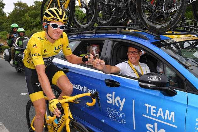 British Geraint Thomas of Team Sky and Team Sky General Manager David Brailsford with a glass of champagne, pictured during the last stage of the 105th edition of the Tour de France cycling race, 116km from Houilles to Paris, France, Sunday 29 July 2018. This year s Tour de France takes place from July 7th to July 29th. POOLxTIMxDExWAELE  x05395100x