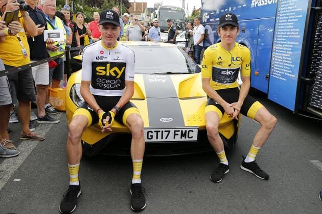 British Chris Froome of Team Sky and Overall winner British Geraint Thomas of Team Sky pose on the hood of a yellow personalized Ford GT sports car, after the last stage of the 105th edition of the Tour de France cycling race, 116km from Houilles to Paris, France, Sunday 29 July 2018. This year s Tour de France takes place from July 7th to July 29th. POOLxYUZURUxSUNADA  x05395148x
